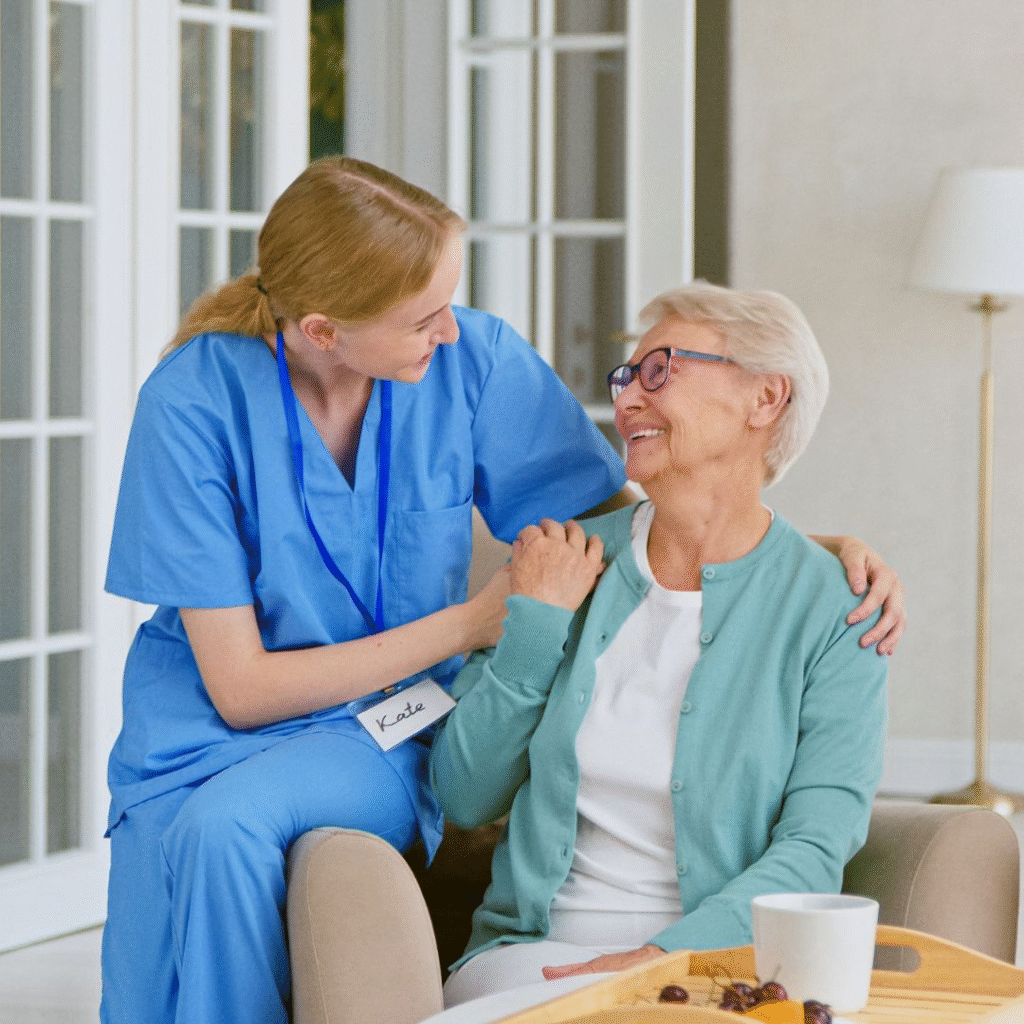 Home care professional supporting an elderly woman to maintain independence, mobility, health and wellness at home.